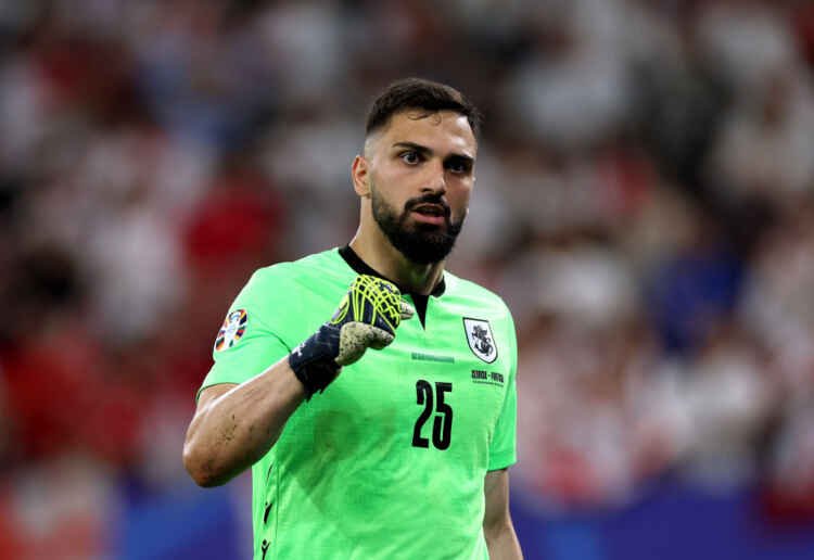 GELSENKIRCHEN, GERMANY - JUNE 26: Giorgi Mamardashvili of Georgia celebrates after making a save in the UEFA EURO 2024 group stage match between Georgia and Portugal at Arena AufSchalke on June 26, 2024 in Gelsenkirchen, Germany. (Photo by Kevin C. Cox/Getty Images)