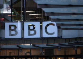 The BBC logo outside the BBC Broadcasting House after Director General of BBC Tim Davie and Chief Executive of BBC News Deborah Turness resigned following accusations of bias at the British broadcaster, including in the way it edited a speech by U.S. President Donald Trump, in London, Britain, November 10, 2025. REUTERS/Jack Taylor